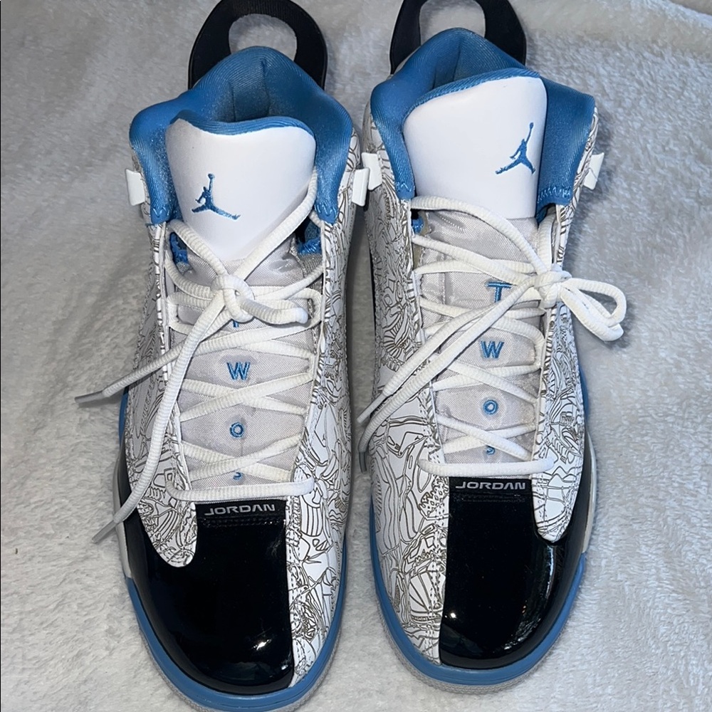 Air Jordan Blue and White Sneakers.  New without tag.  Men’s size 11.5, high top